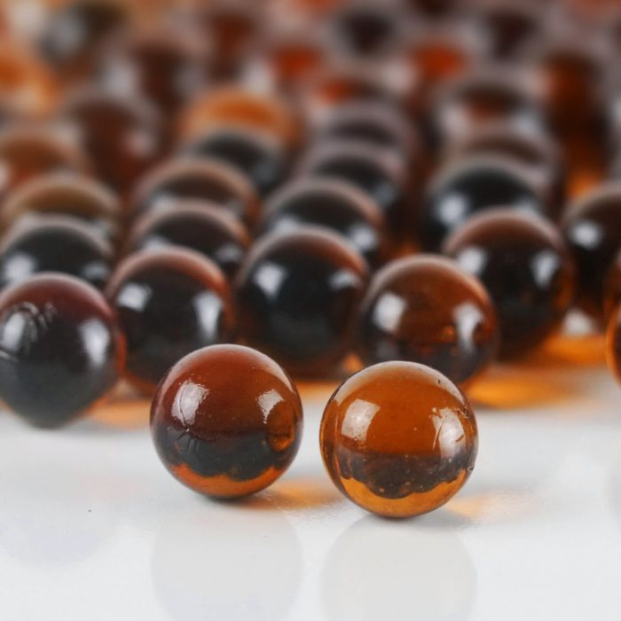 round amber glass marbles